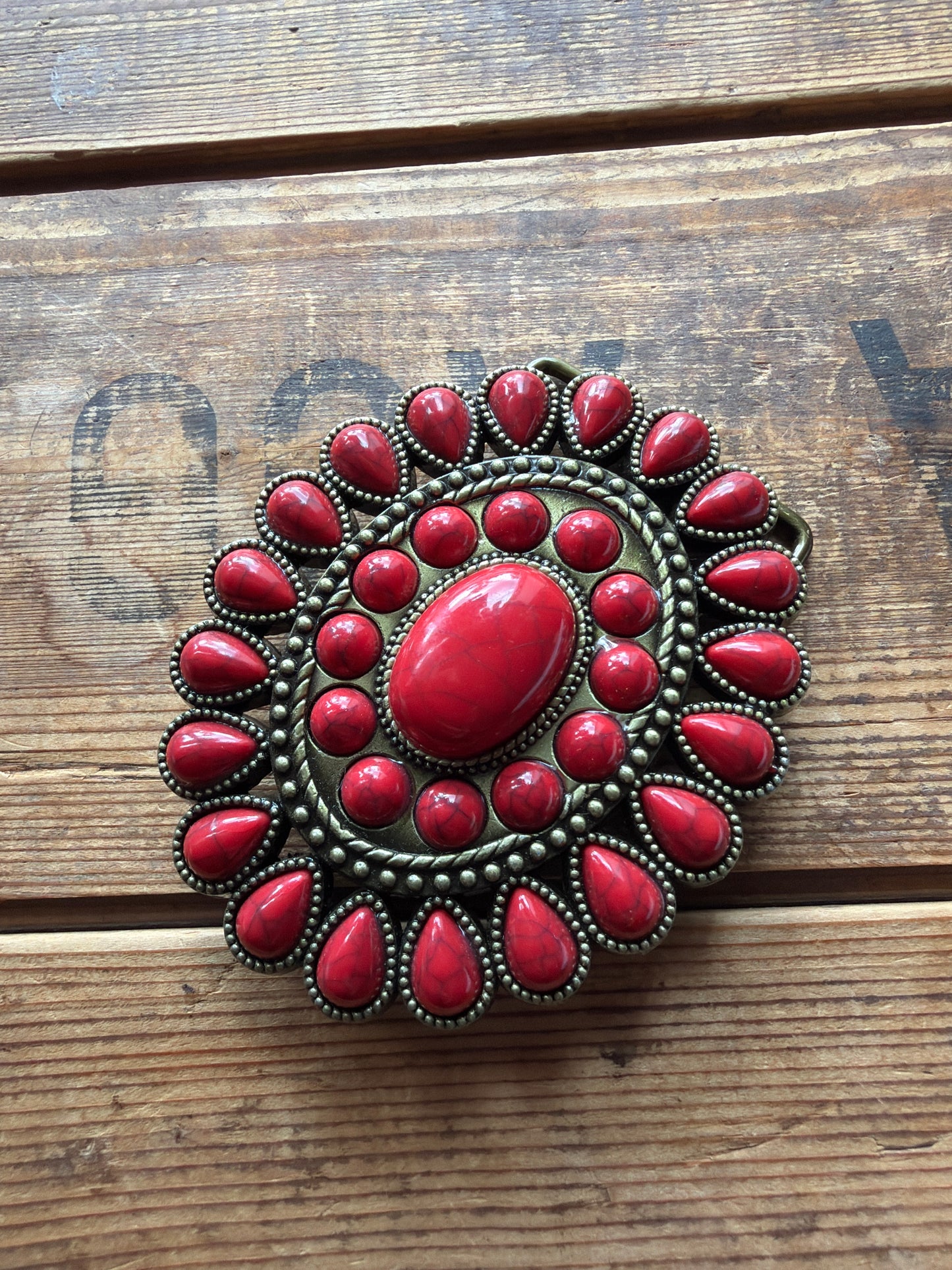 belt buckle red stone