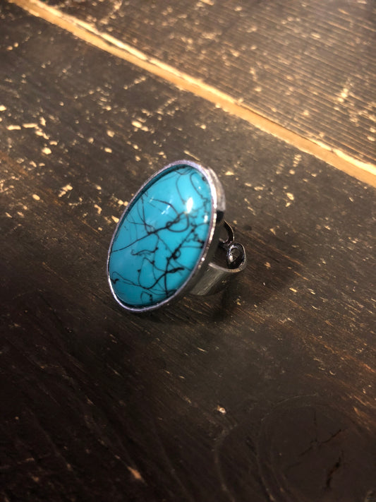 rebell Ring stor turkos med svart melering flexfit